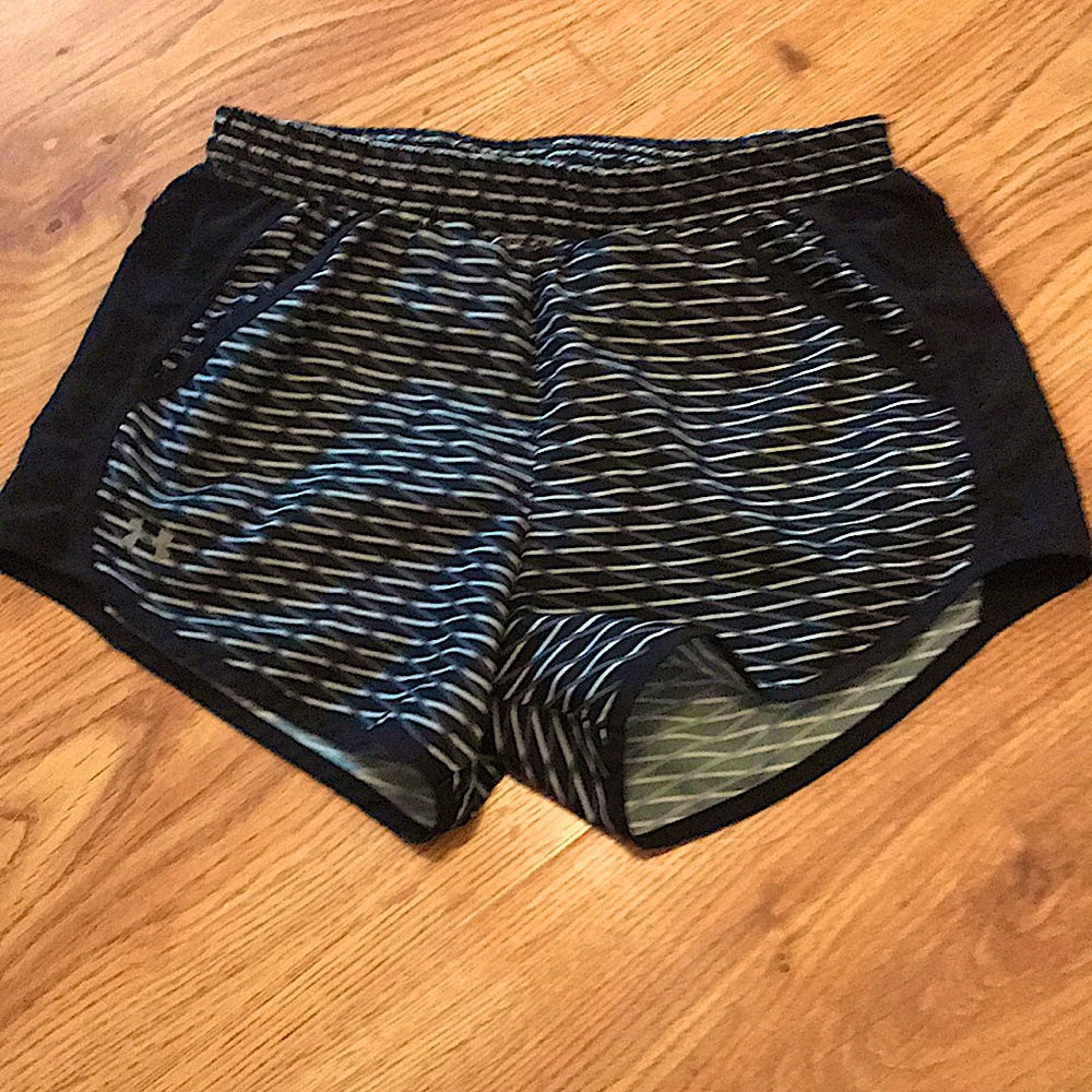 Black and white under amour athletic shorts.